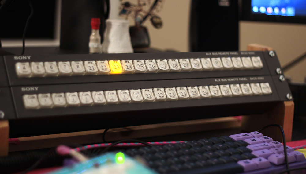 Video router panels sitting on a desk